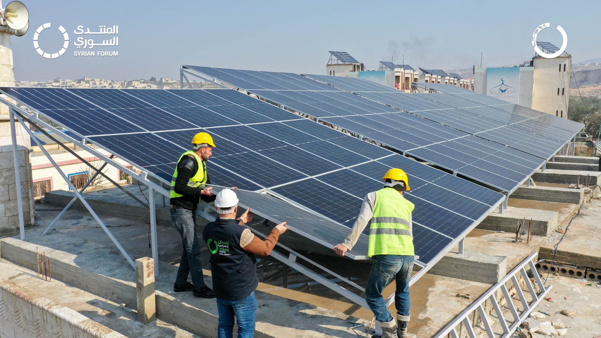 Installation of solar panels at Beit Al-Salam water station in the northern of Idlib