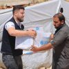 توزيع عوازل خيم على عائلات في مخيم وادي بسليا في أرمناز
